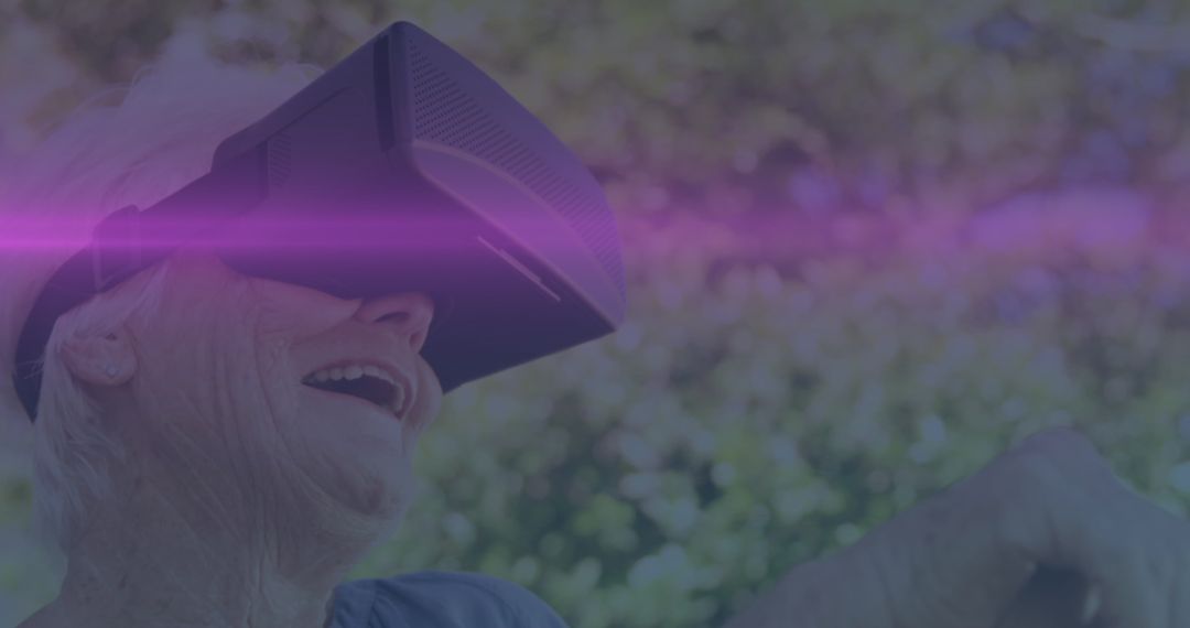 Senior Man Enjoying Virtual Reality Light Effects