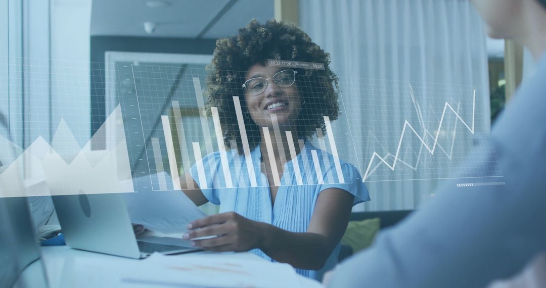 Focused Professional Analyzing Data and Sharing Insights in Modern Office