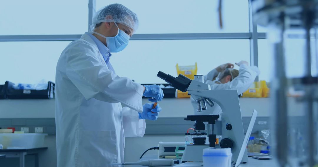 Researcher Conducting Experiment in Laboratory with Advanced Equipment