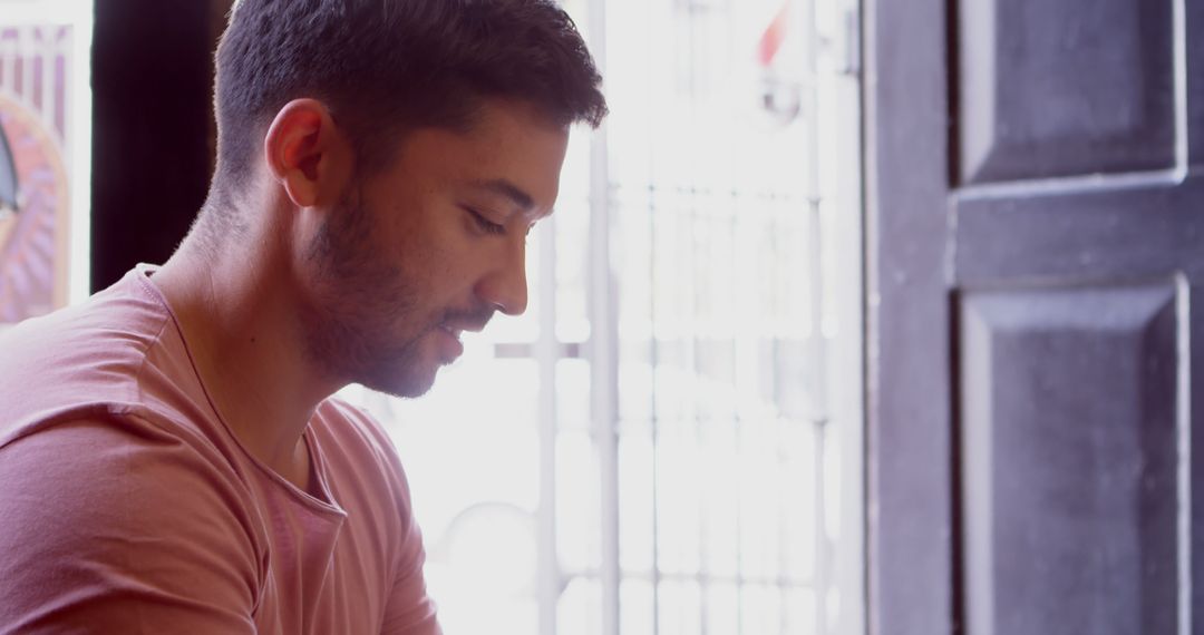 Young Man Pondering Calmly Daylight Sofa Style