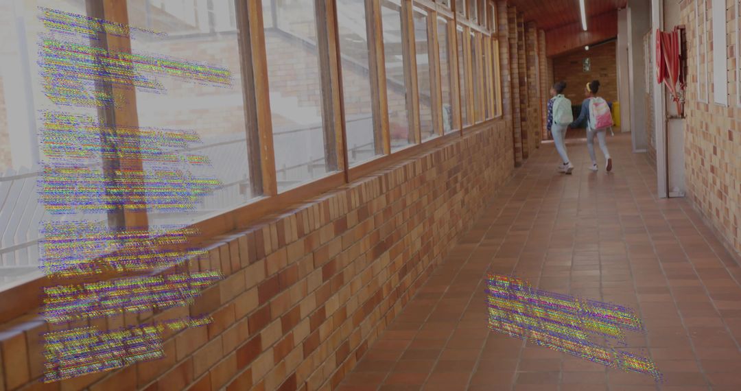 Backpacking Schoolgirls Walking in Rustic School Corridor