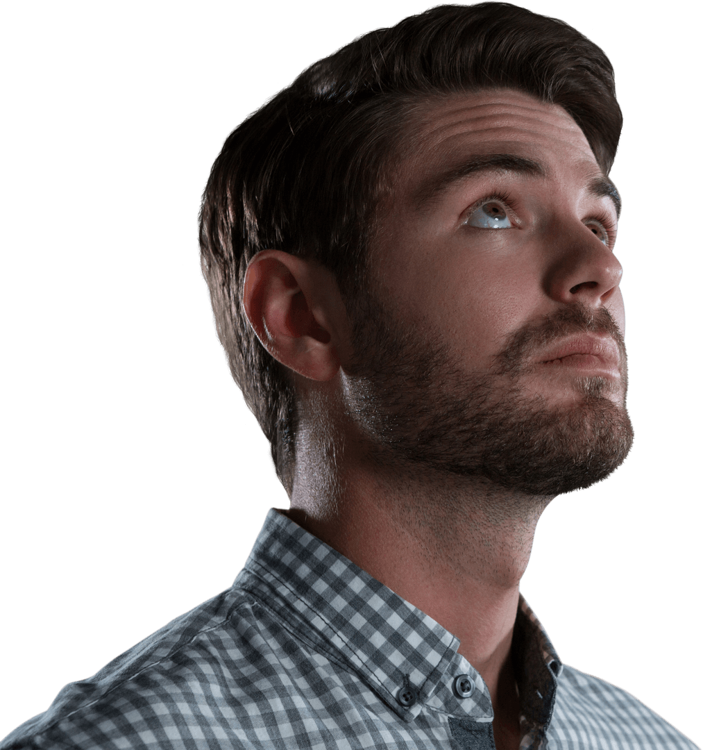 Focused Businessman Gazing Up on Transparent Background