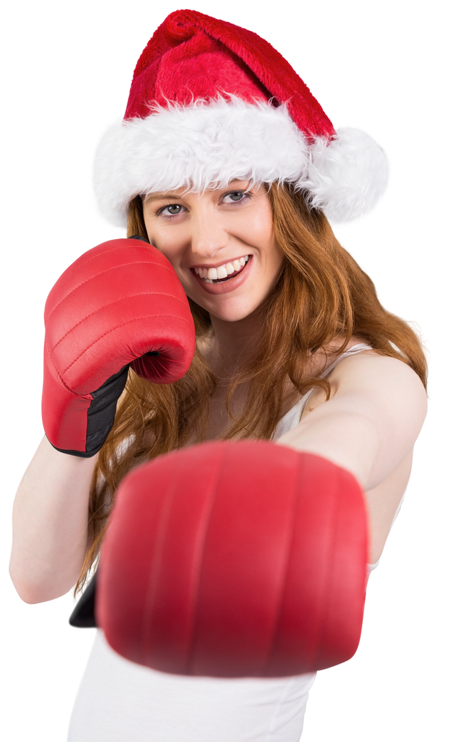 Festive Redhead Punching With Boxing Gloves And Santa Hat - Download Free Stock Images Pikwizard.com