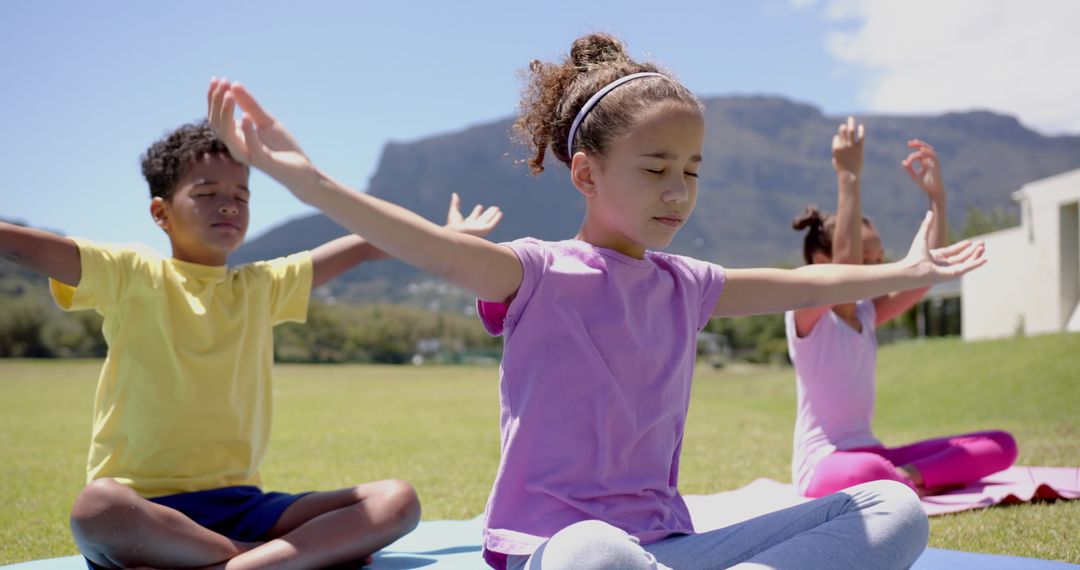 Children Practicing Outdoor Yoga in Mountain Setting