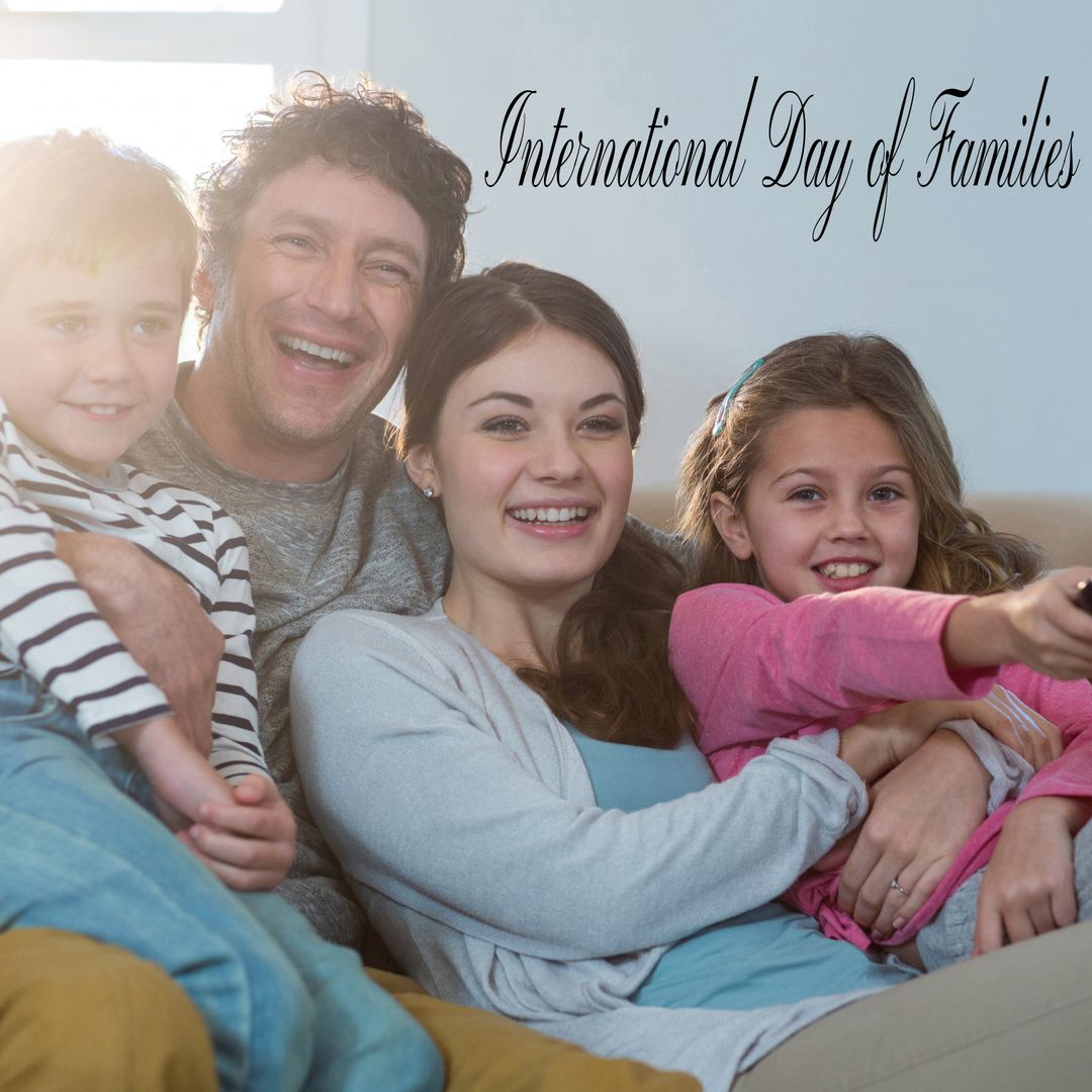 Happy Family Watching TV on International Day of Families Celebration - Download Free Stock Templates Pikwizard.com