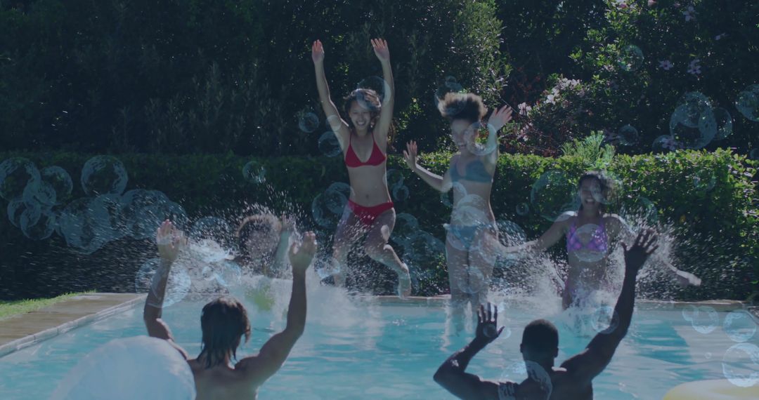 Joyous Friends Dive into Sunlit Pool for Summer Fun