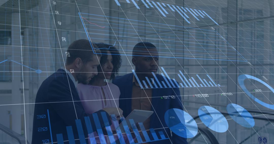 Dynamic Business Team Analyzing Financial Data and Statistics