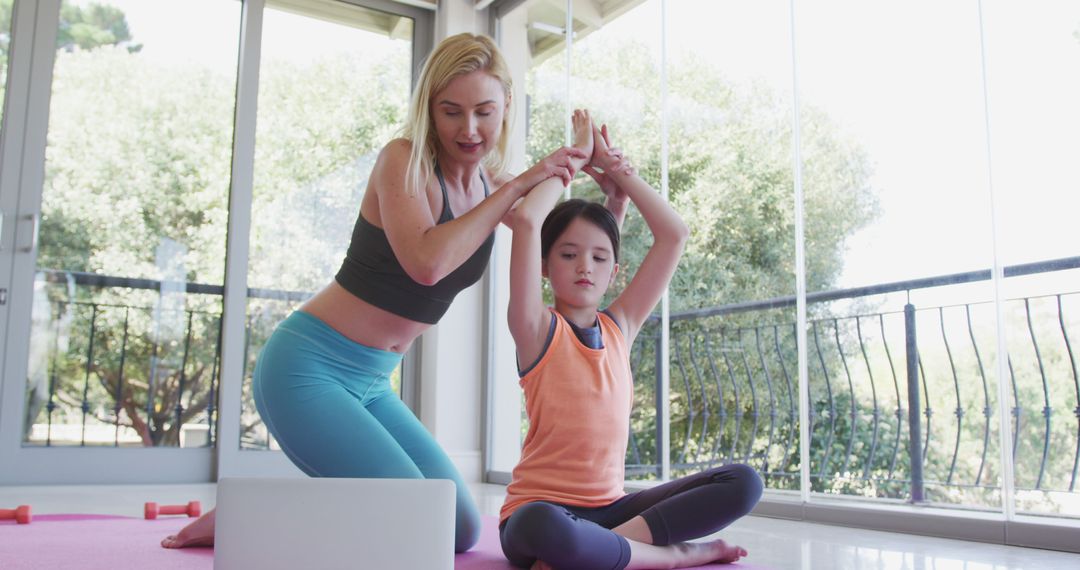 Mother and Daughter Practicing Yoga at Home with Online Class - Free Images, Stock Photos and Pictures on Pikwizard.com