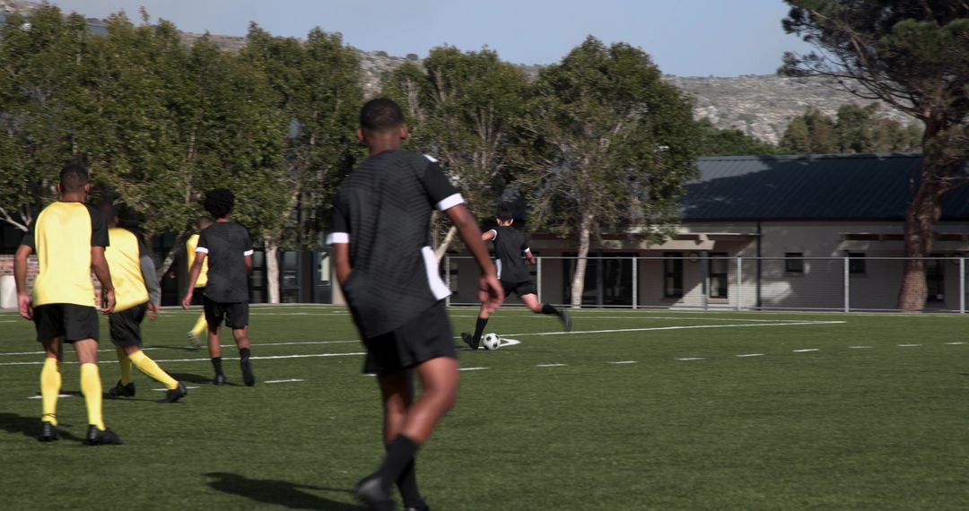 Youth Soccer Practice with Teamwork and Skill Development