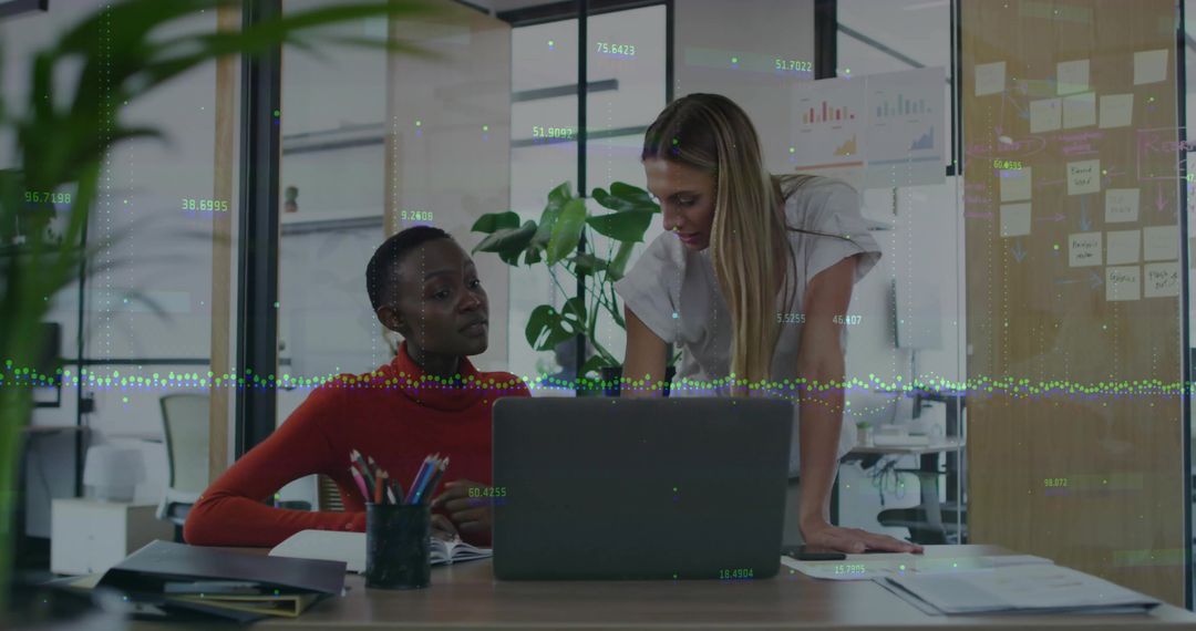 Two Coworkers Collaborating at Modern Office Desk