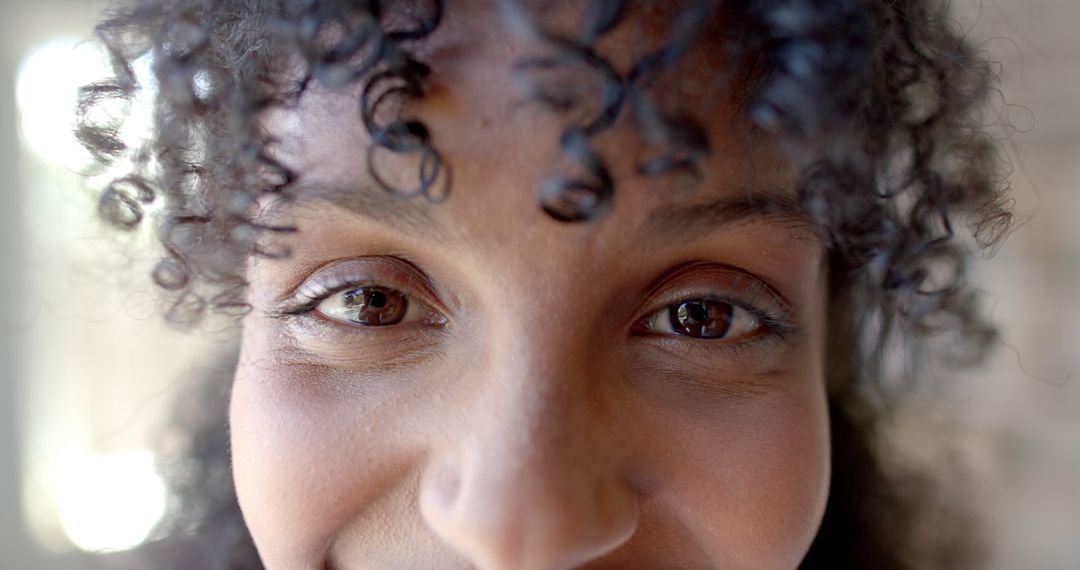 Smiling Teenage Girl with Curly Hair at Yoga Class - Free Images, Stock Photos and Pictures on Pikwizard.com