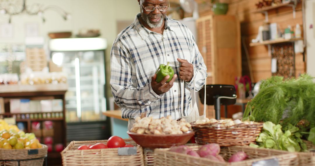 Senior Man Shopping for Fresh Vegetables in Organic Market - Free Images, Stock Photos and Pictures on Pikwizard.com