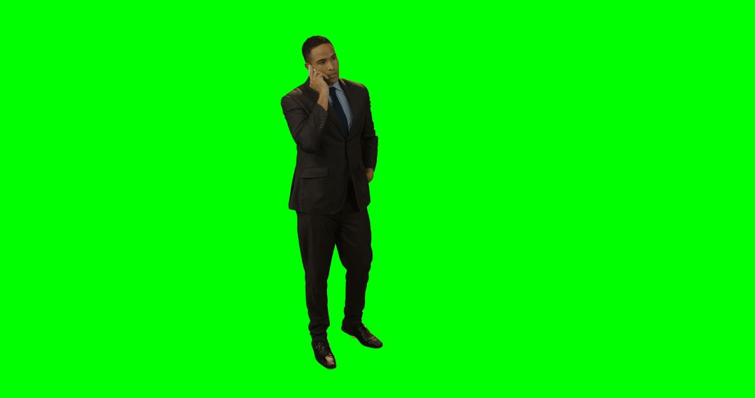 Businessman Talking on Smartphone Against Green Screen Background - Free Images, Stock Photos and Pictures on Pikwizard.com