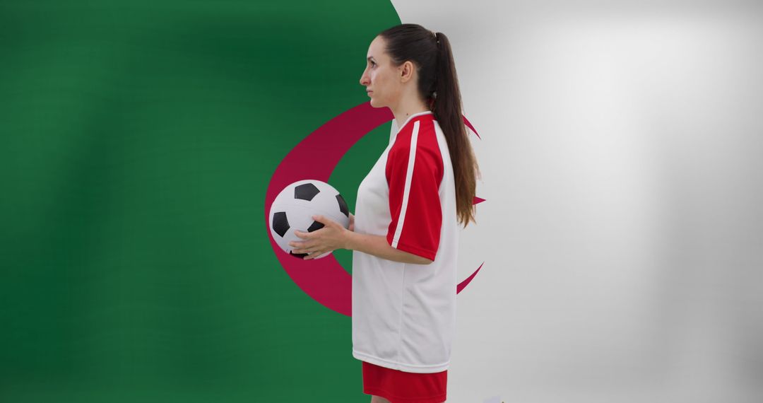 Female Soccer Player Holding Ball in Front of Algerian Flag - Free Images, Stock Photos and Pictures on Pikwizard.com