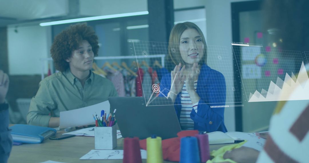 Colleagues Analyzing Data with Digital Graphs for Teamwork Strategy