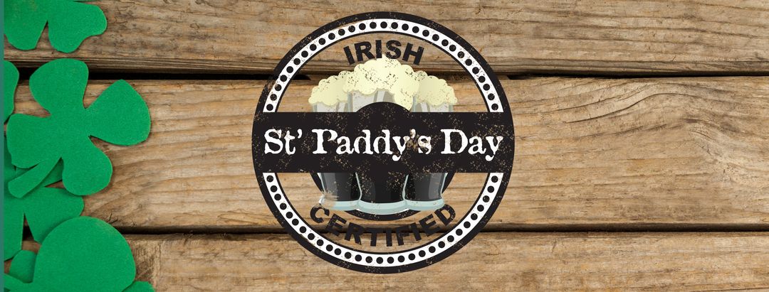 St. Paddy's Day Emblem with Clovers on Wooden Surface