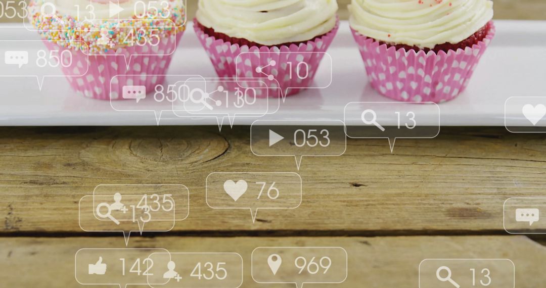 Cupcakes with Social Media Icons on Rustic Wooden Table
