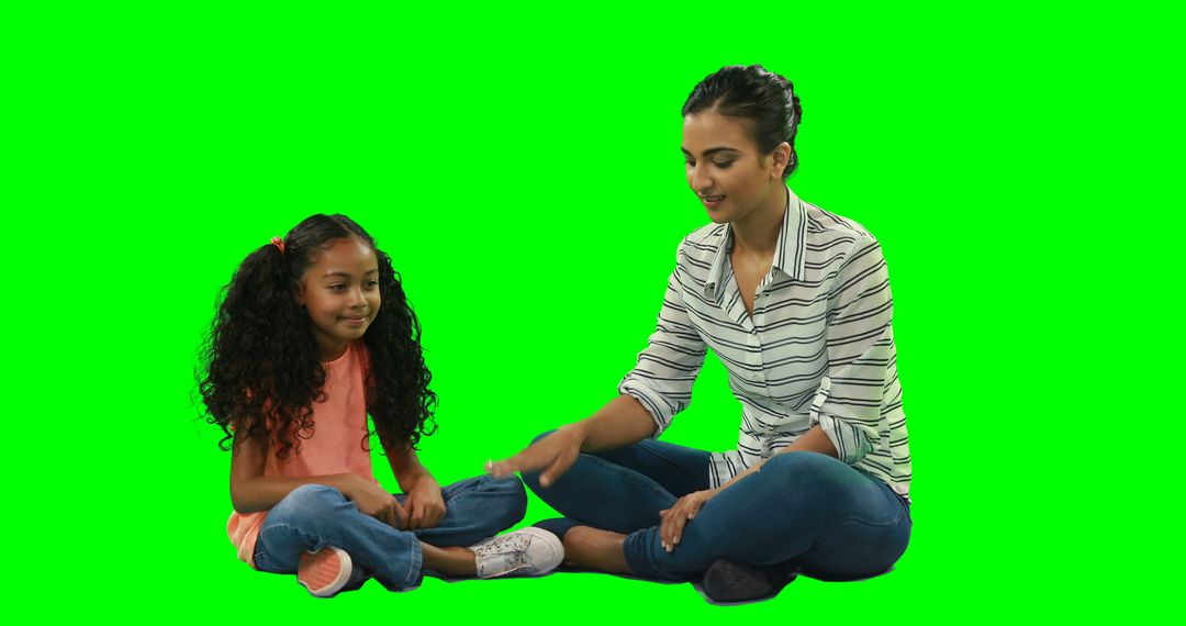 Smiling Mother and Daughter Bonding on Green Screen - Free Images, Stock Photos and Pictures on Pikwizard.com