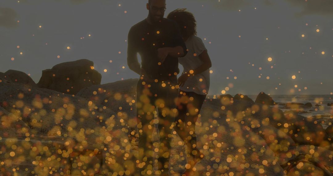 Couple Strolling Beach at Sunset with Soft Bokeh Lighting