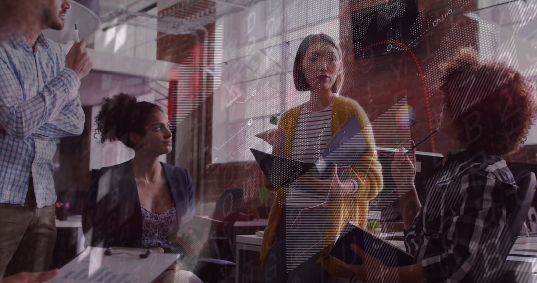 Collaborative Team Analyzing Financial Trends in Modern Office