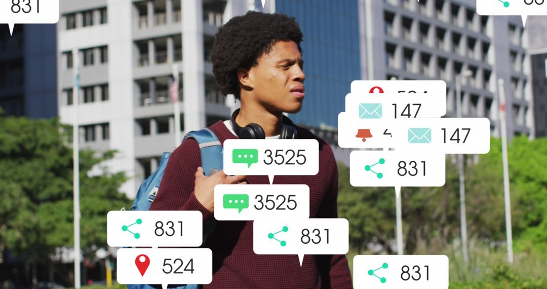 Young Man Interacting with Social Media Analytics Icons in Urban Setting