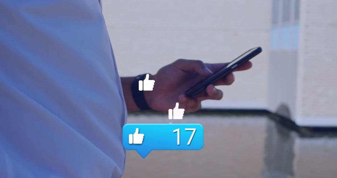 Person Engaging on Smartphone with Social Media Icons
