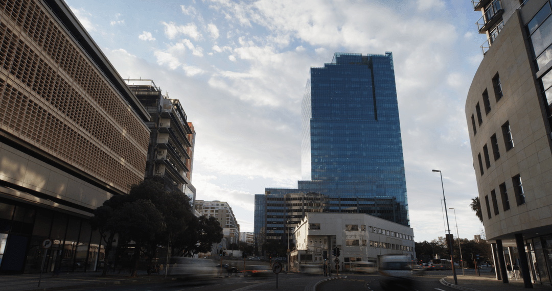Modern Skyscrapers Against Cloudy Transparent Sky