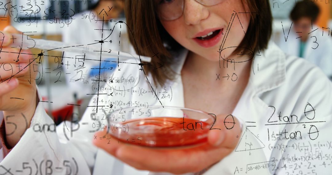 Young Scientist Conducting Laboratory Experiment with Mathematical Equations - Free Images, Stock Photos and Pictures on Pikwizard.com