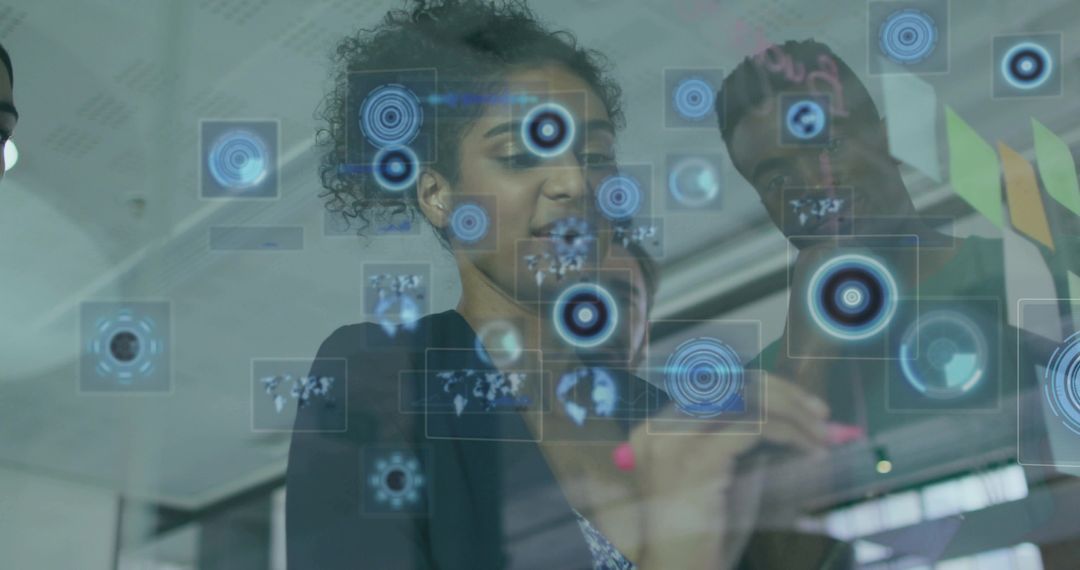 Business Team Examining Holographic Interface with Futuristic Displays