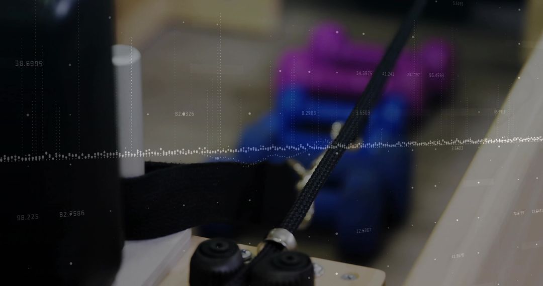 Braided Cable Assembly Through Metal Guide in Workshop Environment