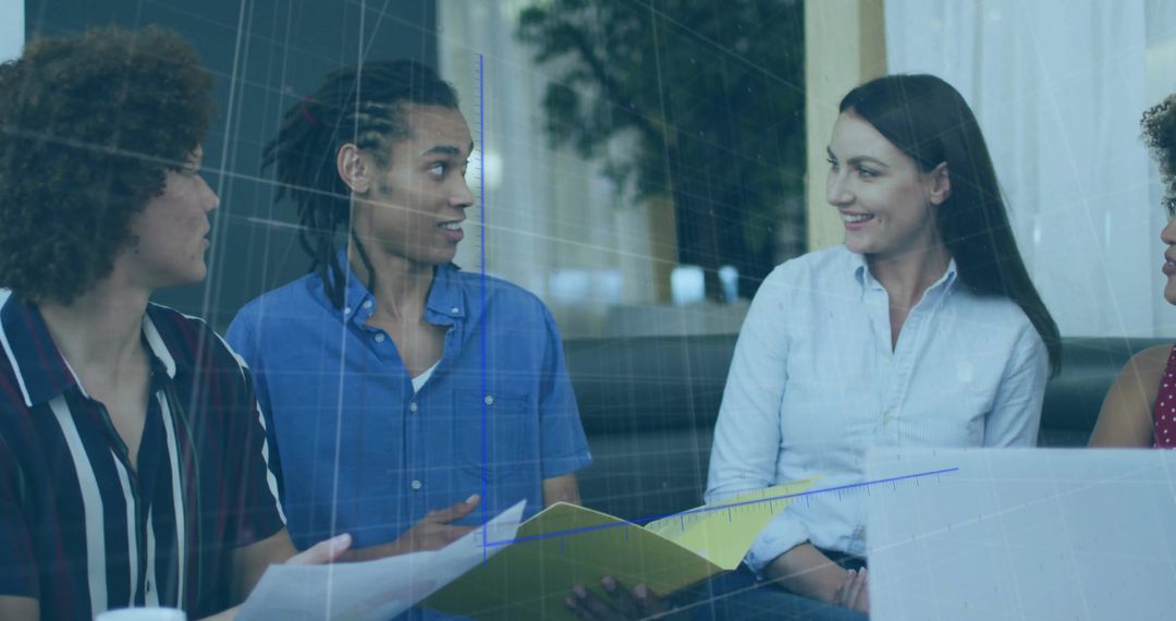 Diverse Team Collaborating in Modern Office Lounge with Documents