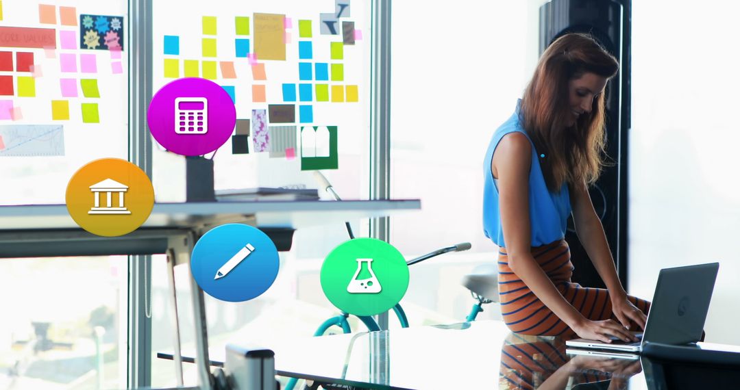 Innovative Businesswoman Using Laptop with Digital Interface Icons