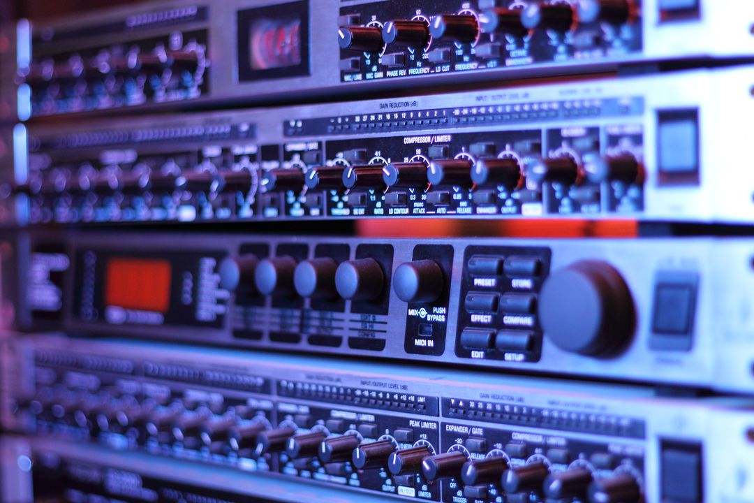 Close-Up of Professional Audio Equipment Rack in Recording Studio
