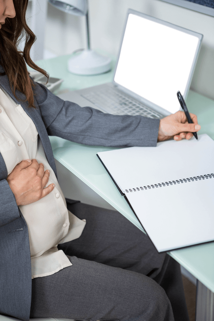 Transparent Pregnant Businesswoman in Home Office Writing in Notebook