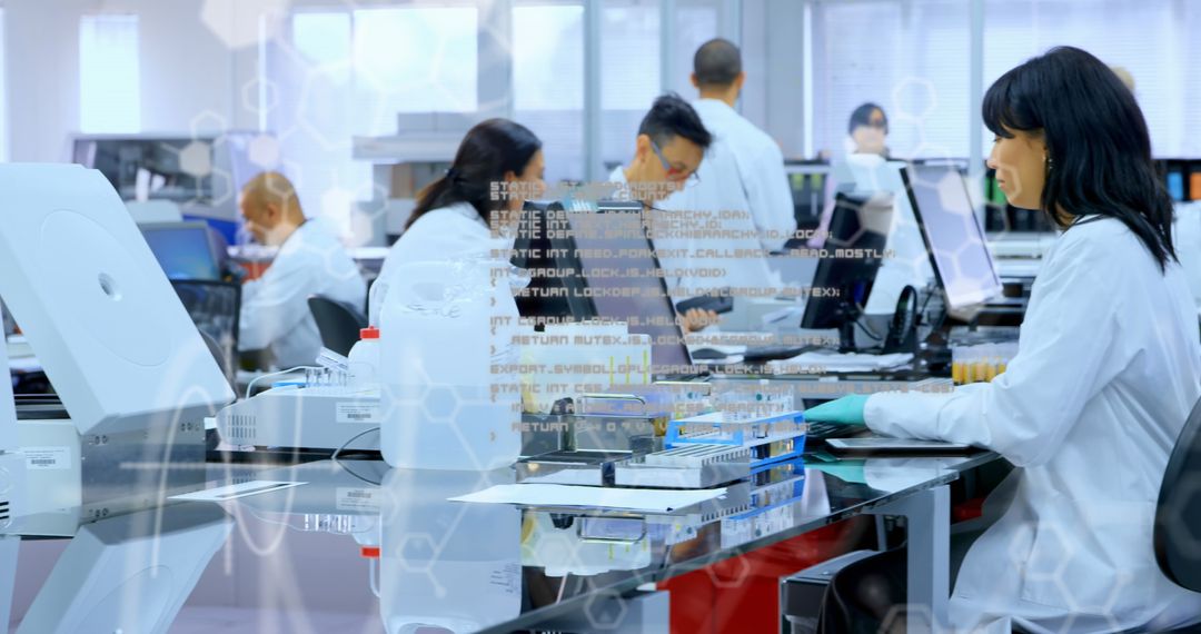 Asian Scientist Analyzing Data in Modern Laboratory