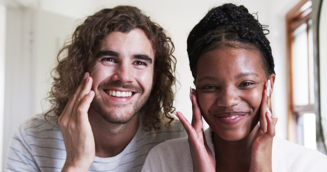 Happy Multicultural Couple with Radiant Smiles in Bright Interior