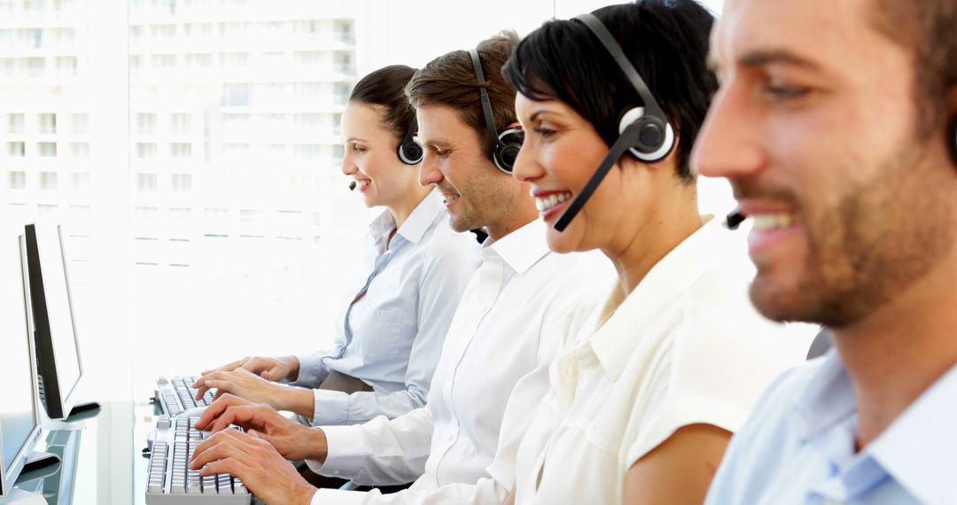 Customer Service Team Using Headsets in Office - Free Images, Stock Photos and Pictures on Pikwizard.com