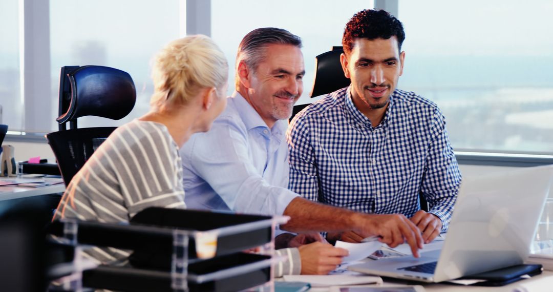 Collaborative Team Working on Business Strategy in Modern Office
