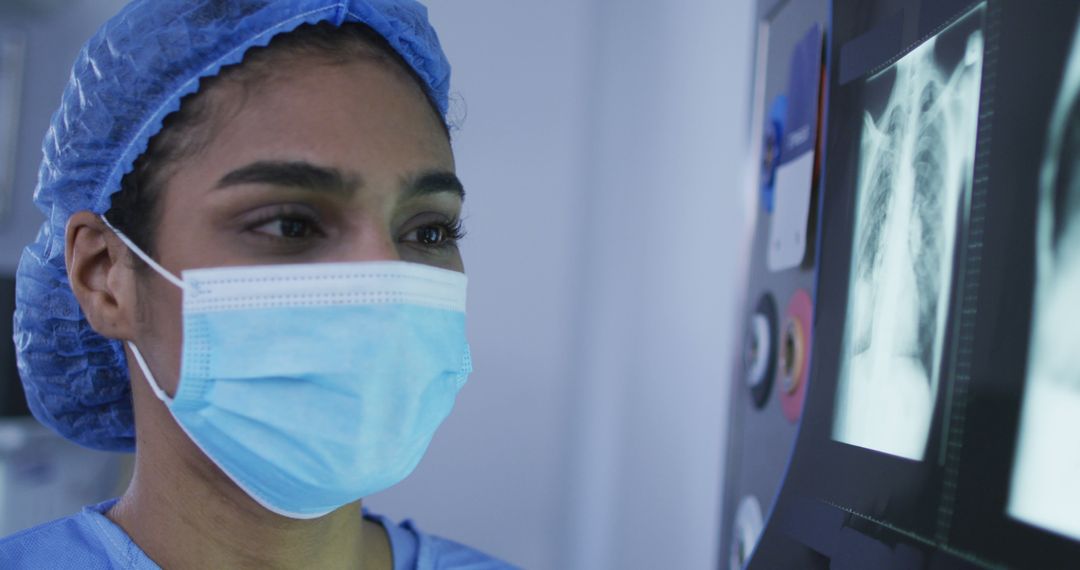 Female Radiologist Examining Chest X-Rays in Hospital - Free Images, Stock Photos and Pictures on Pikwizard.com