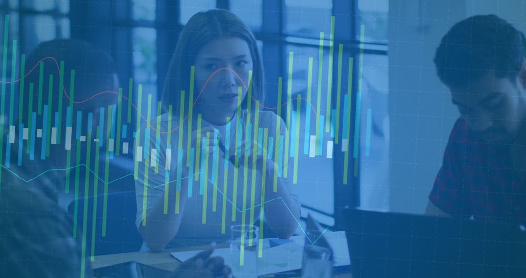 Collaborative Finance Analysis Amidst Digital Graphs Overlaying Team Meeting