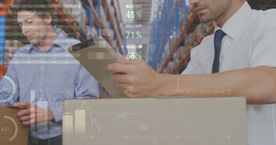 Warehouse Workers Analyzing Data Overlaid with Business Graphs
