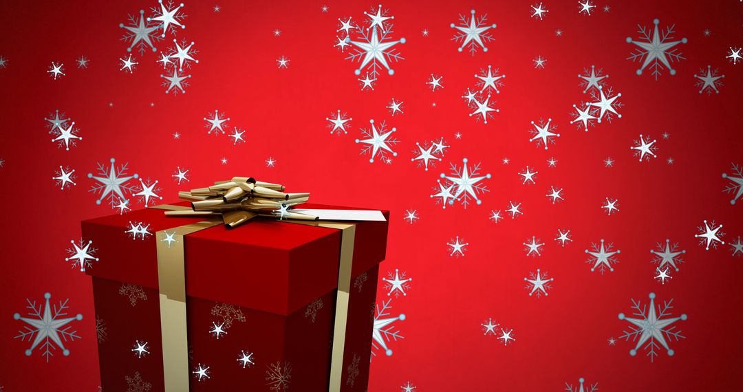 Festive Red Gift Box With Gold Ribbon and Snowfall