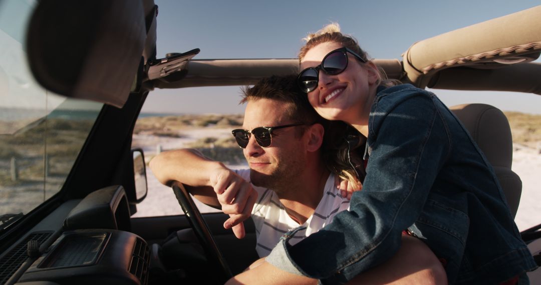 Couple Enjoying Road Trip in Convertible at Beach - Free Images, Stock Photos and Pictures on Pikwizard.com