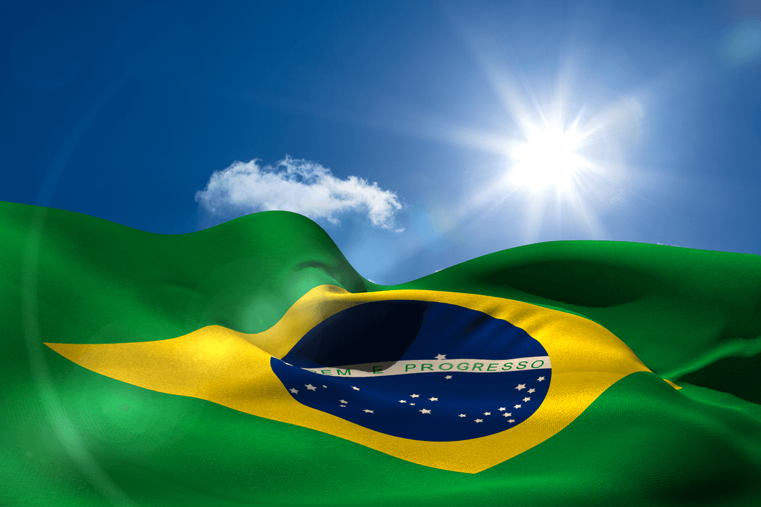 Transparent Concept of Brazil Flag Flying Against Sunlit Sky