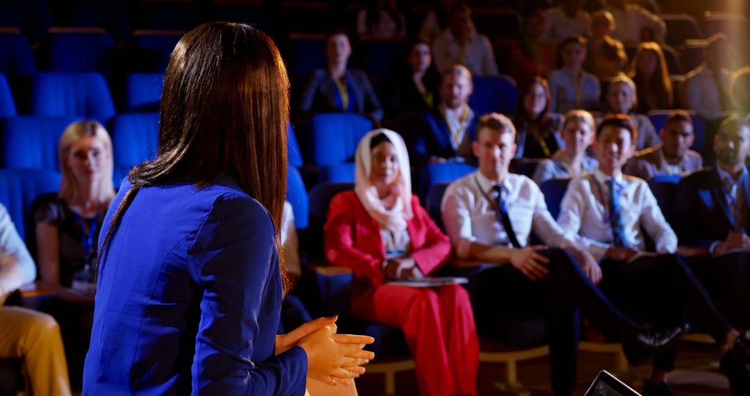 Businesswoman Giving Presentation to Diverse Audience in Conference Room - Free Images, Stock Photos and Pictures on Pikwizard.com