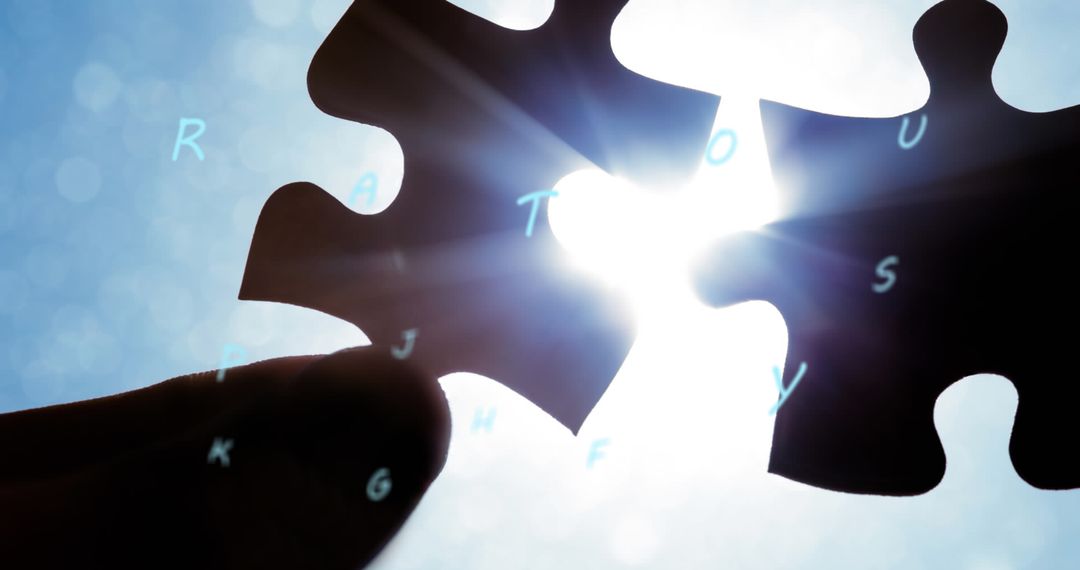 Puzzle Pieces Meeting Against Bright Sky Symbolizing Connection