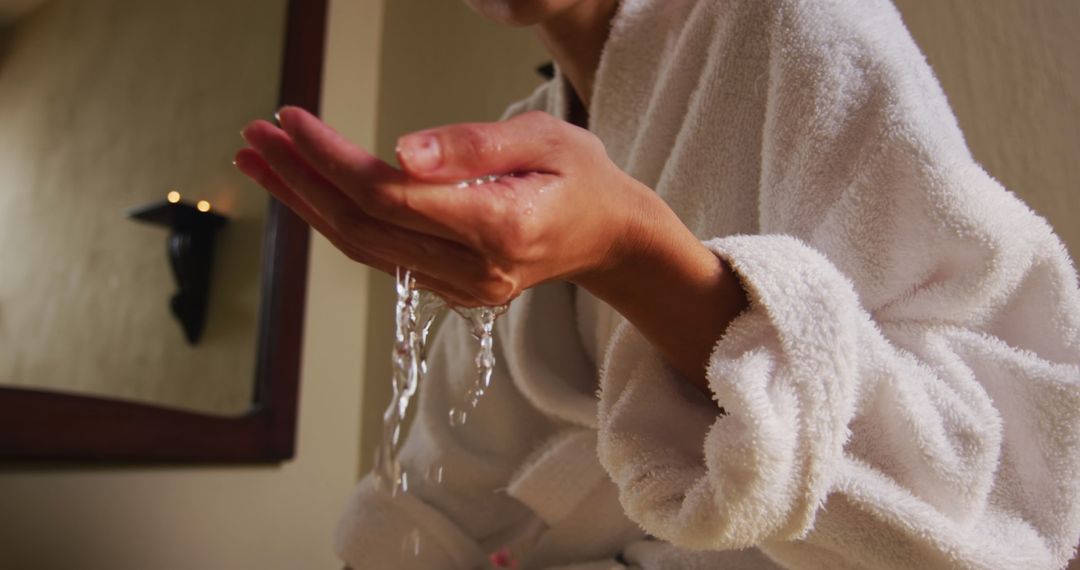 Woman Checking Bath Water Temperature in Relaxed Home Setting