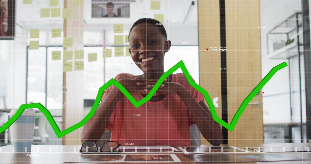 Smiling Professional with Data Graph Overlay in Modern Office