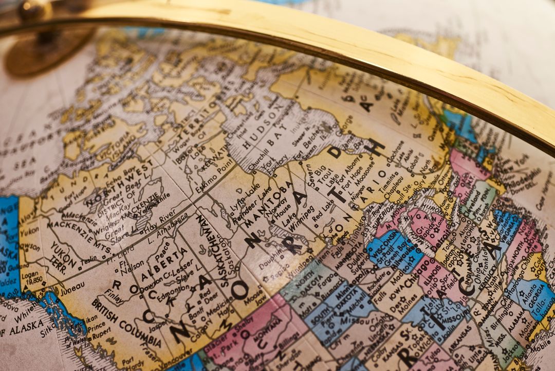 Antique Globe Showing North America With Gold Metal Arm
