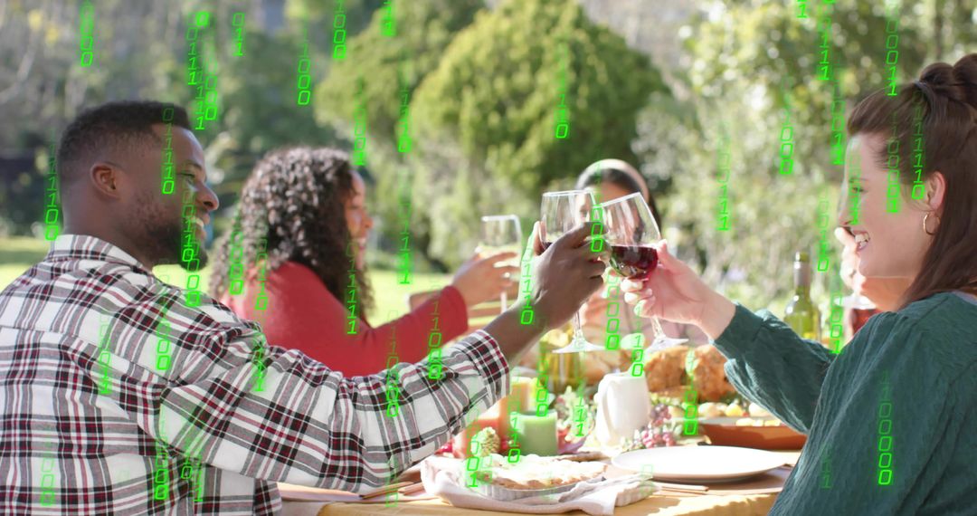 Friends Toasting With Wine Around Outdoor Dinner Table While Green Binary Code Streaming